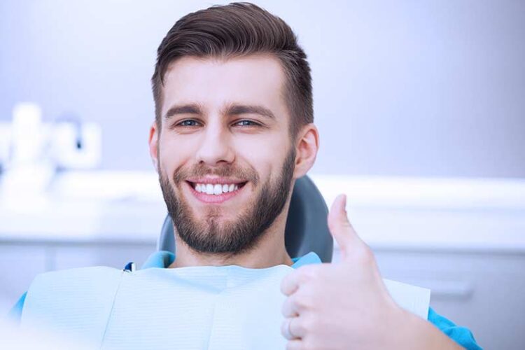 happy new patient at dentist